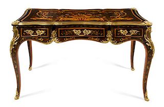 A Louis XV Style Gilt Bronze Mounted Marquetry Bureau Plat Height 32 x width 54 1/2 x depth 29 1/2 inches.