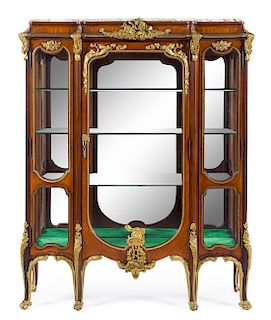A Louis XV Style Gilt Metal Mounted Kingwood Vitrine Height 69 1/2 x width 57 x depth 17 inches.