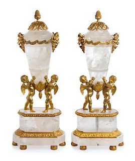 A Pair of Neoclassical Style Gilt Bronze Mounted Rock Crystal Urns Height 19 inches.