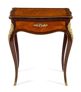 A Louis XV Style Gilt Bronze Mounted Kingwood and Parquetry Sewing Table Height 28 1/2 x width 24 1/2 x depth 17 inches.