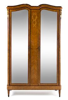 A Louis XVI Style Burlwood and Marquetry Armoire Height 90 3/4 x width 52 1/2 x depth 20 1/4 inches.