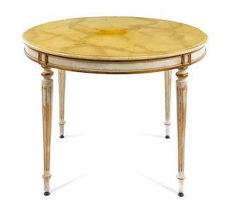 A Louis XVI Style Painted Table Height 31 x diameter of top 39 3/4 inches.