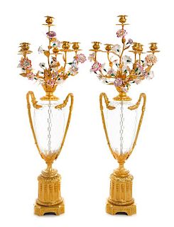 A Pair of Louis XVI Style Cut Glass, Gilt Bronze and Porcelain Seven-Light Candelabra Height 35 inches.