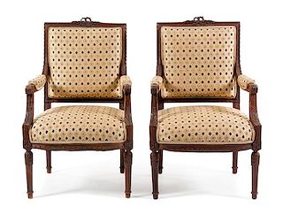 * A Pair of Louis XVI Style Walnut Fauteuils Height 39 1/8 inches.
