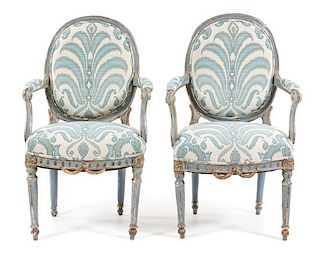 A Pair of Louis XVI Style Painted and Parcel Gilt Fauteuils Height 37 1/2 inches.