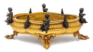 A French Gilt and Patinated Bronze Jardiniere Height 11 x width 30 inches.