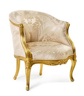 A Louis XVI Style Giltwood Bergere Height 30 inches.