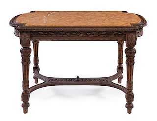 A Louis XVI Style Walnut Center Table Height 31 1/4 x width 51 x depth 32 1/4 inches.