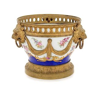 * A Sevres Style Gilt Bronze Mounted Porcelain Cache Pot Height 4 x diameter 6 3/4 inches.