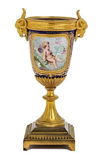 * A Sevres Style Gilt Bronze Mounted Porcelain Urn Height 8 5/8 inches.