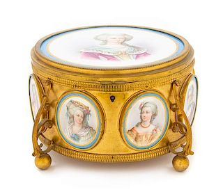* A Sevres Style Porcelain Mounted Gilt Metal Box Diameter 6 3/4 inches.