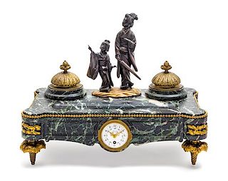 A French Bronze and Marble Encrier Width 15 3/4 inches.