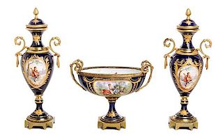 A Sevres Style Gilt Bronze Mounted Porcelain Garniture Height of urn 12 3/8 inches.