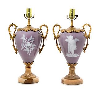 A Pair of French Gilt Bronze Mounted Pate-sur-Pate Porcelain Urns Height overall 17 1/2 inches.
