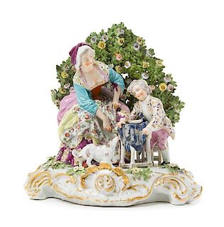 A Continental Porcelain Figural Group Height 11 1/4 x width 10 1/2 inches.