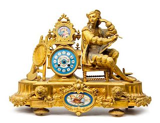 * A Napoleon III Style Gilt Metal and Porcelain Mantel Clock Height 15 3/4 x width 21 1/2 inches.