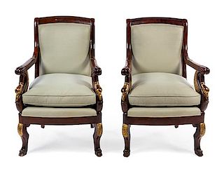 A Pair of Louis Philippe Style Parcel Gilt Mahogany Fauteuils Height 36 1/4 inches.