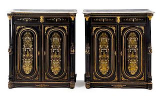 A Pair of Napoleon III Gilt Bronze Mounted Ebonized Meubles d'Appui Height 50 3/4 x width 46 x depth 19 inches.
