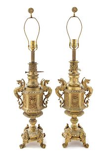 * A Pair of French Neoclassical Gilt Metal Lamps Height overall 26 inches.