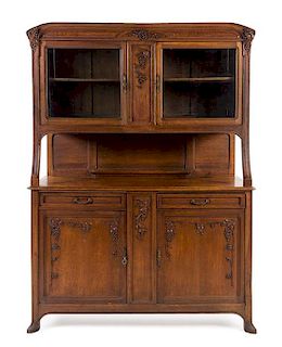 * A French Oak Buffet a Deux Corps Height 83 1/2 x width 60 1/2 x depth 20 1/4 inches