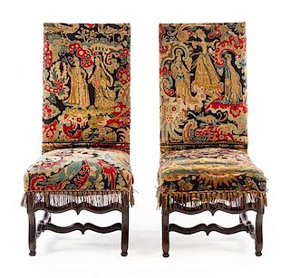 A Pair of Renaissance Style Oak Side Chairs Height 45 inches.