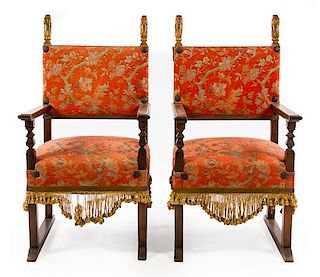 A Pair of Italian or Spanish Baroque Walnut Armchairs Height 43 inches.