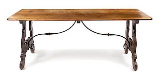 A Spanish Baroque Style Iron Mounted Trestle Table Height 31 3/8 x width 80 x depth 27 inches.