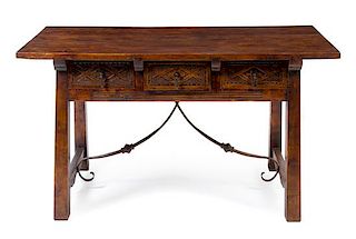 A Renaissance Style Iron Mounted Trestle Table Height 31 x width 56 5/8 x depth 27 inches.