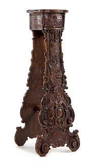 A Continental Carved Oak Pedestal Height 53 x width 12 1/2 x depth 12 1/2 inches.