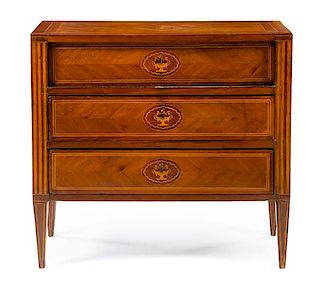An Italian Marquetry Commode Height 35 3/4 x width 38 3/4 x depth 17 1/4 inches.