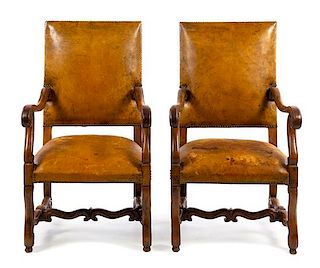 A Pair of Italian Baroque Style Walnut Armchairs Height 41 1/2 inches.