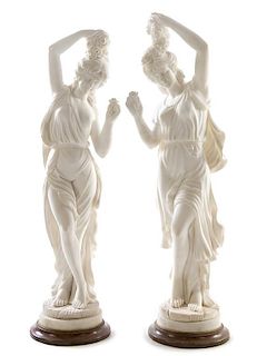 A Pair of Italian Marble Figures Height of tallest 42 1/4 inches.