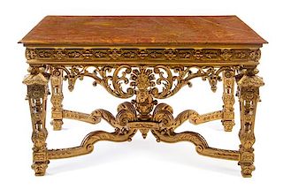 An Italian Giltwood Center Table Height 32 x width 53 x depth 32 inches.
