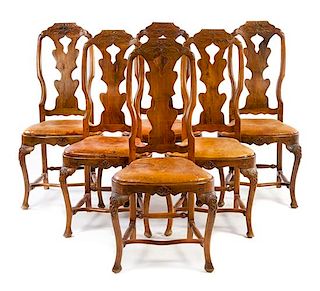 A Set of Six Italian Fruitwood Dining Chairs Height 41 inches.