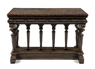 * A Flemish Baroque Style Walnut Table Height 30 1/2 x width 47 x depth 24 1/2 inches.