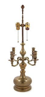 A Continental Brass Four-Light Candelabrum Height 29 inches.