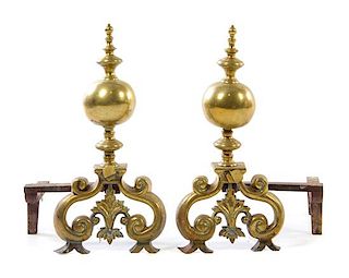 A Pair of Continental Brass Andirons Height 25 inches.