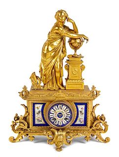 A Continental Gilt Metal and Porcelain Inset Figural Mantel Clock Height 9 inches.