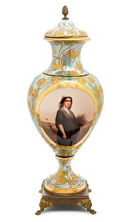 * A Vienna Gilt Bronze Mounted Porcelain Urn Height 28 1/4 inches.