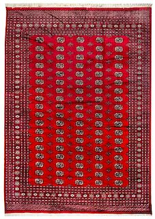 A Bokhara Wool Rug 10 feet 11 inches x 8 feet 3 inches.