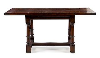 A Jacobean Style Oak Table Height 30 5/8 x width 65 3/8 x depth 27 1/4 inches.