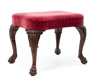 * A George I Style Carved Mahogany Stool Height 21 x width 25 1/2 x depth 18 1/2 inches.