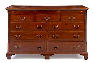 * A Late George III Mahogany Mule Chest Height 42 1/2 x width 68 1/4 x depth 22 3/4 inches.