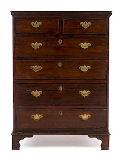 A George III Style Oak Chest of Drawers Height 46 1/4 x width 33 5/8 x depth 20 3/4 inches.