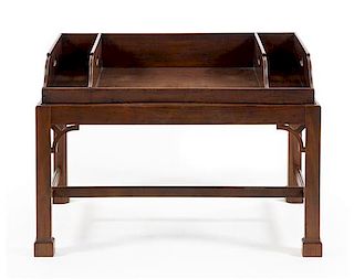 A George III Style Mahogany Butler's Tray Table Height 24 x width 32 1/2 x depth 21 1/2 inches.
