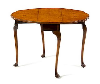 A George III Style Birdseye Maple Drop-Leaf Side Table Height 22 1/4 x width 24 1/4 x depth 10 1/4 inches (closed).