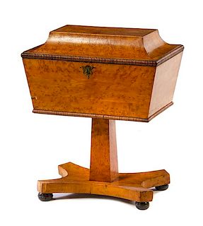 A Regency Style Maple Tea Poy Height 26 x width 21 1/4 x depth 14 1/2 inches.