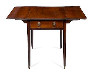 A Regency Mahogany Pembroke Table Height 28 x width 34 x depth 21 inches.