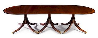 * A Regency Style Mahogany Dining Table Height 29 1/2 x width 52 1/2 x length 142 inches (fully extended).