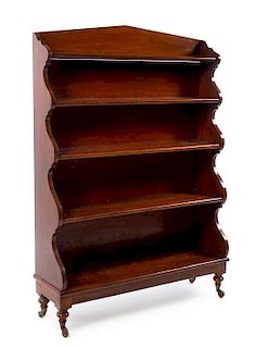 A William IV Style Mahogany Bookcase Height 60 1/8 x width 42 x depth 12 1/4 inches.